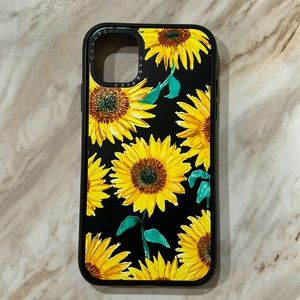Casetify iPhone 11 Impact case - sunflowers with solid black background.